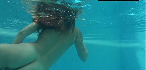  Pornstar Mia Ferrari in blue bikini underwater